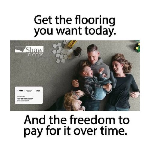 Happy family on the gray carpet floor from The Carpet Shop - Inspired Floors for Less in Benton Harbor, MI