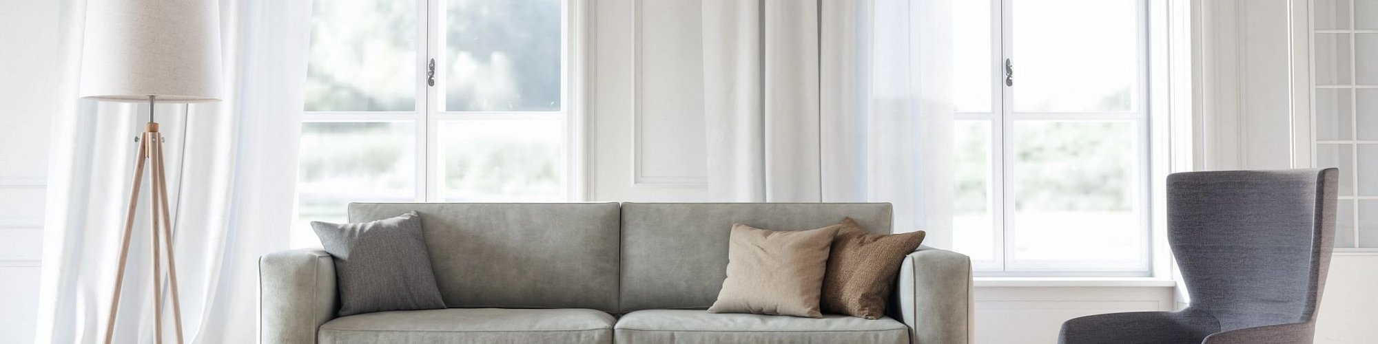 gray sofa and gray area rug from The Carpet Shop - Inspired Floors for Less in Benton Harbor, MI